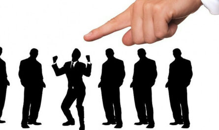 Changing other people- Pointing a finger at one man in a group