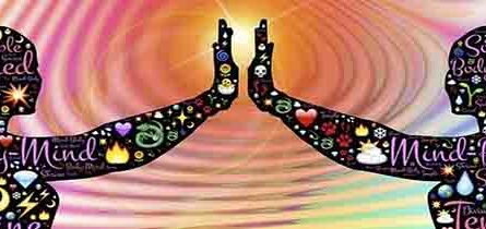 Pure natural manifestation- two women joining hands to manifest energy