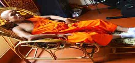 Bad to fall asleep during meditation- monk sleeping in reclining chair