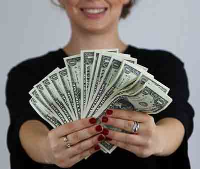Wealth DNA Code Woman Holding Cash